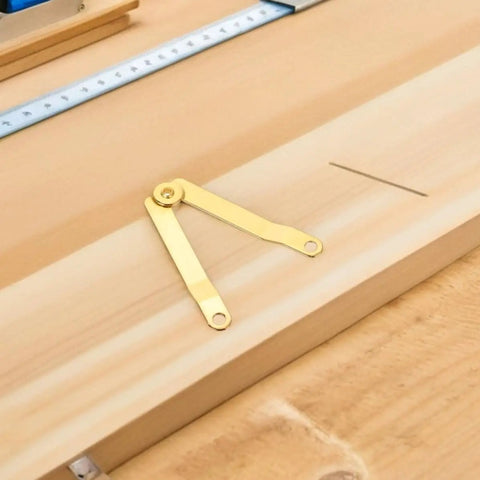 Golden Iron Lid Support Hinges for Jewelry Box and Treasure Chest with sleek design on a wooden surface.