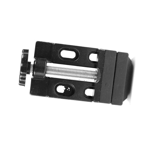 Premium Aluminum Mini Bench Vise Heavy Duty Clamping Vice With Hella Smooth Pivot And Locks Down Tight on a workbench clamp detail.