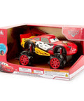 Lightning McQueen Light Up Remote Control Car With Monster Truck Wheels in packaging, showing front and side details.
