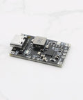 Two Piece 2S 3S Bms Charger Protection Board For Lithium Ion Polymer Batteries Featuring Type C Input Plus 1.5A Boost Module, compact black circuit board.