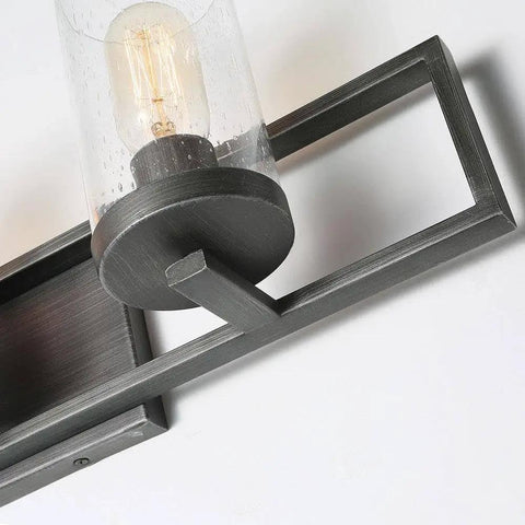 Close-up of Farmhouse Rustic Bathroom Vanity Light Fixture With Wood Frame And Cylindrical Bubbled Glass in antique silver finish.
