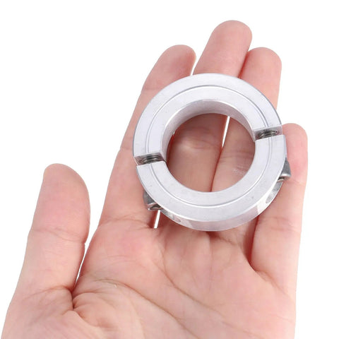 Four Pack Double Split Clamp-On Shaft Collar For 1-1/8 Inch Shaft in hand, two-piece aluminum alloy, 1-7/8 inch outer diameter