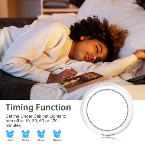 Under Cabinet Puck Lights Remote Battery Operated Wireless Stick On 4 Pack with timing function illustration near sleeping person