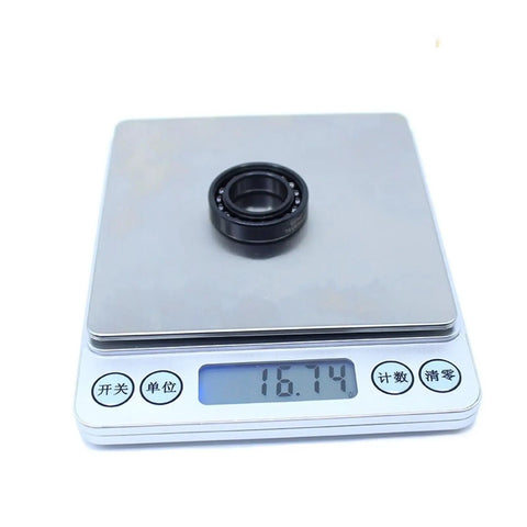 Heavy Duty 6903 High Temp Ball Bearings 17 X 30 X 7 mm on scale showing weight, solid cast iron housing, industrial grade.