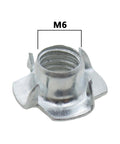 Close-up of M6 4 Pronged T Nut from set of 20 for woodworking furniture and cabinets, includes adjustable leveler pads for climbing holds.