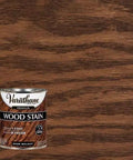 Rich Dark Walnut Wood Stain One Quart Heavy Duty Formula in metal container against dark wood background.