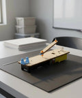 Knockout Classroom Demo Machine Featuring Slick Electric Reciprocating Linkage Model Linear Motion Apparatus Mechanical Demonstration Setup With Adjustable Stroke Iron Shaft Built Rock Solid on lab table with visible components.