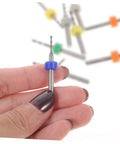 Hand holding a micro tungsten steel bit from the 30-Piece Cobalt PCB Drill Bit Set For Circuit Board Engraving And Jewelry Crafting.
