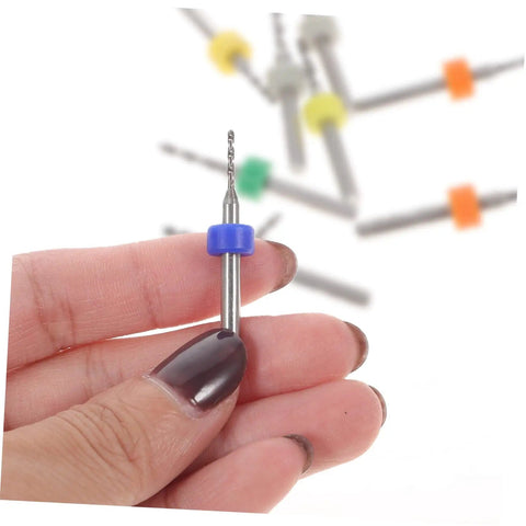 Hand holding a micro tungsten steel bit from the 30-Piece Cobalt PCB Drill Bit Set For Circuit Board Engraving And Jewelry Crafting.