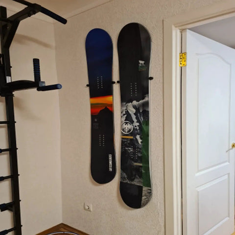 Beefy Ski And Snowboard Wall Mount Storage Rack Invisible Floating Garage Display Organizer securely holds two snowboards on the wall.