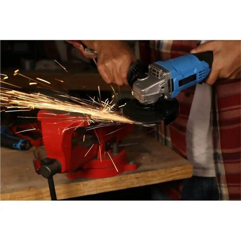 Person using 20V Lithium Ion Cordless Angle Grinder Built Like A Tank With An Adjustable Side Handle for cutting metal, sparks flying.