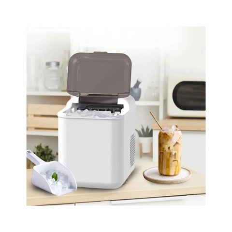 Fast Countertop Ice Maker Portable With Self Cleaning Setup Produces Crisp Cubes In Minutes, showing ice cubes and drink setup.