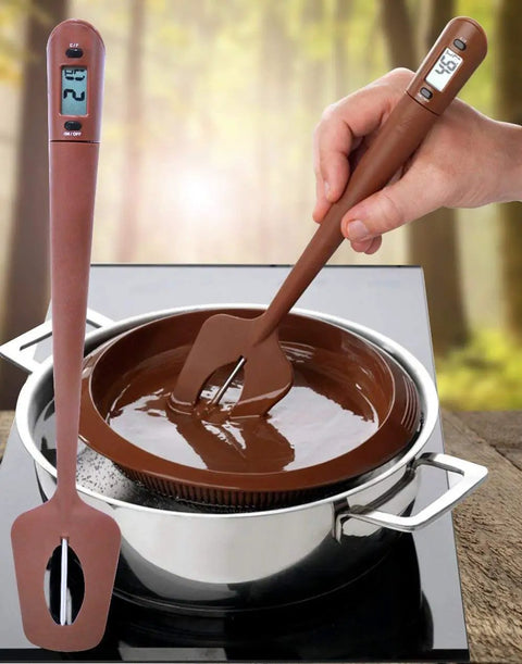 Instant Read Candy Thermometer Spatula With Built In Digital Temperature Reader in brown stirring chocolate on stovetop