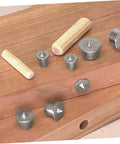 Various components of the 16 Piece Shelf Pin Drilling Jig And Dowel Center Points Kit For Smooth Woodworking Projects.