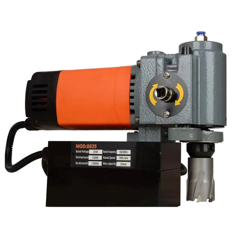 High Performance Brushless Magnetic Drill Press Low Profile Portable Design Light Weight For Industrial Core Drilling And Home Improvement Projects Heavy Duty Metal Processing With Power Up To 1300W Durable Construction Easy Setup Fast Drilling Speeds on a black and orange metal base.
