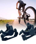 Rock Solid Mechanical Disc Brake Calipers Set For Road And Mountain Bikes Dual Piston Wire Pull Aluminum Alloy Front And Rear Calipers Kit Easy Install Lightweight Corrosion Resistant Black Finish shown with cyclist in background.