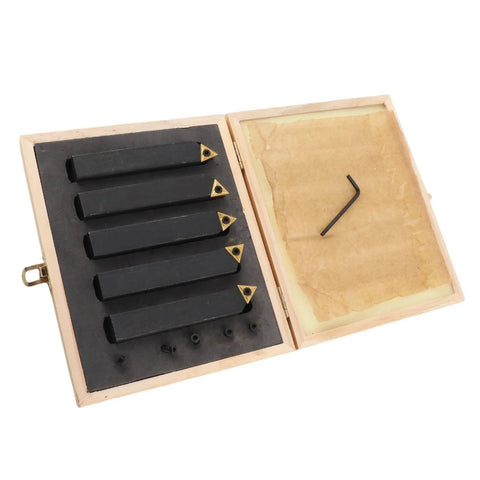Five-piece carbide turning tool set with indexable inserts in a wooden case; black tools with gold carbide tips.