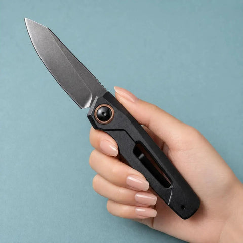 Hand holding Go To EDC Folding Knife With Aluminum Handle, Ultra Lightweight 60G, 7 Cm Reverse Tanto Blade, Stonewashed Finish.