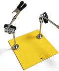 Must-Have Helping Hands Soldering Tool With Steel Base And Adjustable Joint Clamp, Two-Arm PCB Holder on yellow surface