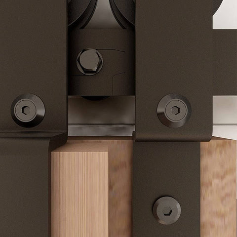 Close-up of metal components of the Beefy 11Ft Bypass Barn Door Hardware Kit For 66 Inch Double Doors with industrial grade steel.