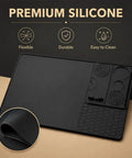 Straight Fire Premium Silicone Coffee Drip Mat With Built In Tamping Station, Non Slip Overflow Shield For Oster Perfect Brew, Heavy Duty Barista Counter Organizer And Quick Drainage Tray, Black with flexible edges.