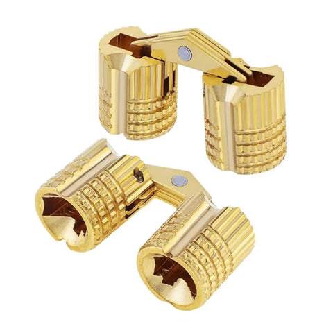 Concealed Cabinet Hinges Copper Barrels Cylindrical Hideaway Hardware with Brass Look for Modern Home Decor in close-up view