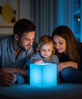 Family enjoying Rechargeable LED Color Changing Cube Light 8 Inch Dimmable With Remote 16 RGB Colors 4 Modes Waterproof