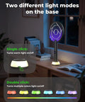Electric Fly Swatter Bug Zapper Racket 4000V with LED Screen in dual mode setting, on wooden table near window, light modes shown.