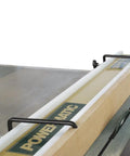 Level Up Your Woodshop With These Rock Solid Universal Fence Clamps Spanning Three Half To Four Half Inches secured on a table saw.