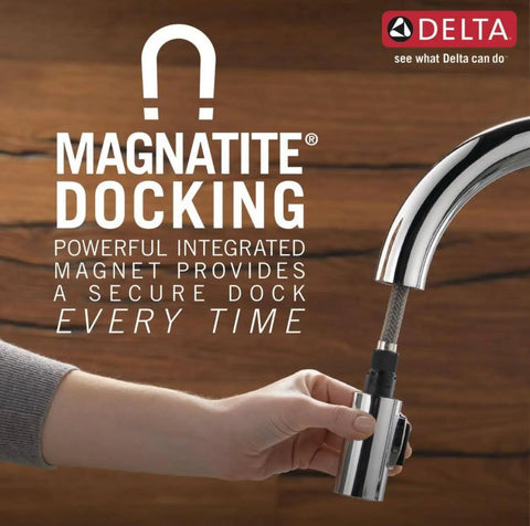 Person demonstrating Magnetite docking feature on Matte Black Kitchen Faucet With Mid-Rise Pull-Out Sprayer For Single-Hole Install.