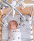 Up Up And Away Musical Baby Crib Mobile For Boys With Sky Balloons Clouds And Planes Calming Lullabies Soother Featuring 12 Soothing Tunes Lil Nursery Decor Gift shown over sleeping baby