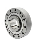 Front view of a silver steel backstop device for gear reducers, one-way clutch component, with bolt-hole flange
