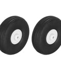 Lightweight Foam Wheel Set For RC Airplanes And Helicopters 4 Inch Diameter Wheel And Tire Kit, front view of two black foam wheels