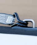Close-up of Beefy 4 Pack Ratchet Tie Down Straps One And One Quarter Inch By 16 Foot With Vinyl Double J Hooks in use for securement