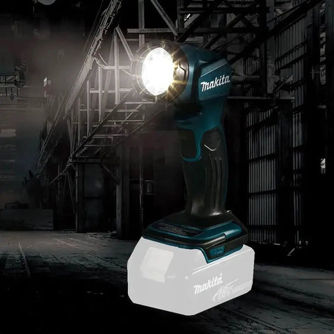 Beast 18V LXT Cordless LED Flashlight With 160 Lumens Four LED Array 12 Position Pivot Head in dim warehouse