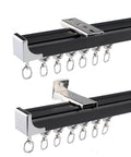 Heavy Duty Aluminum Sliding Barn Door Track Kit With Dual Nylon Rollers And No Sweat Wall Or Ceiling Mounts, black metal runner detail.