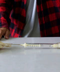 PATIKIL compression spring—side view in transparent housing with scale; 0.8 mm wire, 10 mm OD, 305 mm length