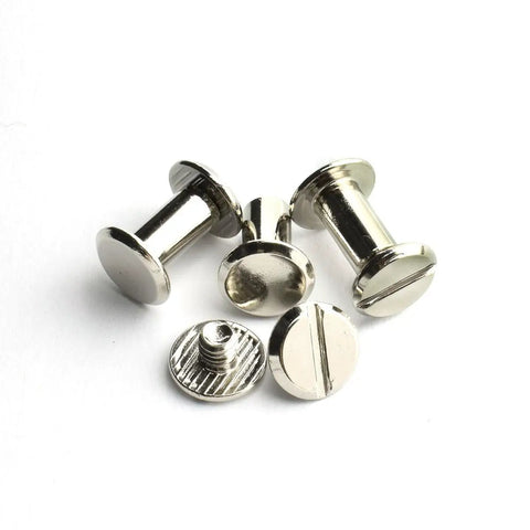 Sixty Pack Silver Chicago Screws Hella Tough Three Eighths Inch Flat Head Screw Posts Nickel Plated Metal Rivets close-up.