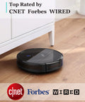 Certified Refurbished BoostIQ RoboVac 11S MAX Robot Vacuum Cleaner operating on hardwood floor under furniture