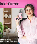 Woman holding Pink Cordless Electric Screwdriver Set Rechargeable For Women With LED Light Pivotal Handle in living room