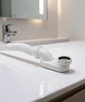 G1-1/2 Flat Bathtub Drain Pipe Kit Flexible Waste Pipe for Freestanding Tub Low Profile P-Trap White 92cm on countertop.