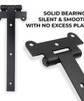 Close-up of 12 Inch Black Door Hinges Set For Gates And Barn Doors Includes 12 Mounting Screws And 2 Hinges Tough As Nails Heavy Duty 4mm Iron With Black Powder Coat Ideal For Sheds Fences And Outdoor Use.