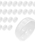 Heavy Duty Clear Wrought Iron Patio Furniture Foot Glides Caps 1.5 Inch Non Slip Table Leg Covers 24 Pack Smooth glide caps stacked.