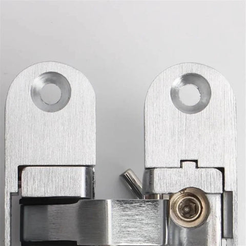 Close-up of Two Pack 180 Degree Concealed Cross Door Hinges Zinc Alloy Invisible Hinge Set for gate and cabinet furniture hardware.