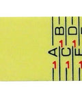 Close-up of yellow Oversized Bricklaying Rule With Fiberglass Reinforced ABS For Pro Masonry showing spacing scales A to K.