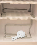 White Plastic Refrigerator Door Stopper Hook Replacement Catch To Keep Fridge Secure And Fresh Prevent Swinging Universal Fit For Most Freezer Frige Latch Brackets You Need For Kitchen Essentials Today placed inside a freezer.