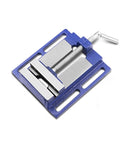 Blue compact fixed-table vise for woodworking with silver jaws and screw handle, 5in jaw capacity.