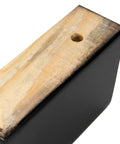 Close-up of an L-shaped piece from the 4 Pcs Black Wood Furniture Legs Set L Shaped Table Feet Bed Riser Compatible For Cabinets And Sofas Easy Install.