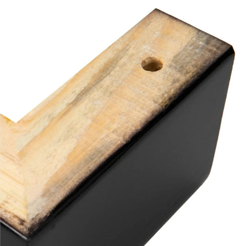 Close-up of an L-shaped piece from the 4 Pcs Black Wood Furniture Legs Set L Shaped Table Feet Bed Riser Compatible For Cabinets And Sofas Easy Install.
