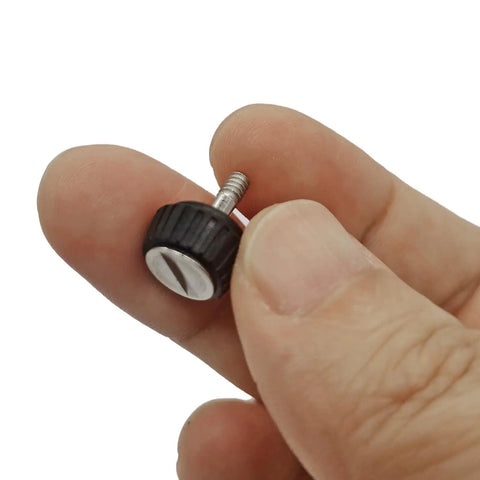 Heavy Duty Black Thumb Screws For Motorola Apx Earpieces And Shoulder Mic Radios Solid Metal Lock Secure Replacement Hardware Pack Of Six, held in hand.